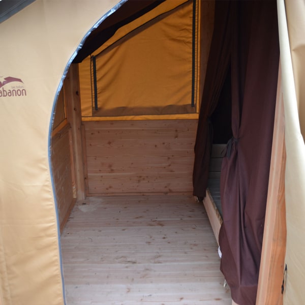 Baroudeur 2 tent with breathable, weather-resistant canvas and elevated platform.
