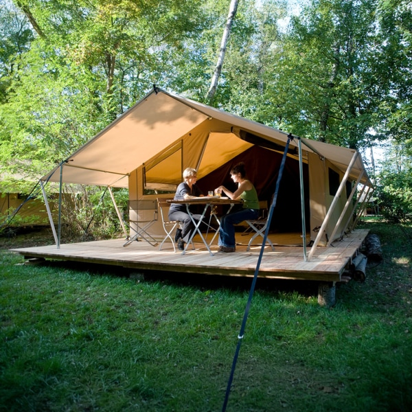Classic 400 Permanent glamping tent with spacious living area and terrace.