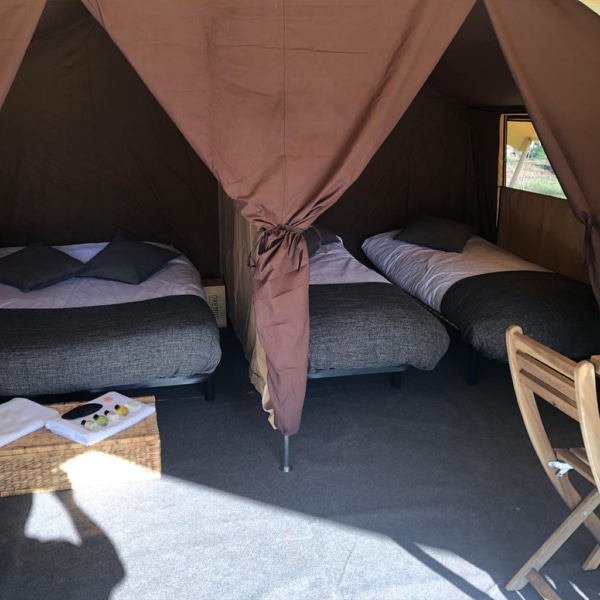 Interior of Classic 400 Permanent tent with two separate bedrooms and large windows.