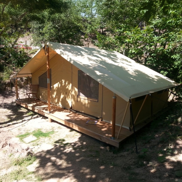 Permanent glamping tent Classic 700 with steel-wood frame and waterproof canvas.