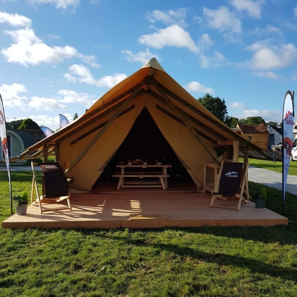 The Crusoe XL Tent offers all-season comfort with a wooden frame and breathable canvas – perfect for stylish family glamping and permanent eco-camps.