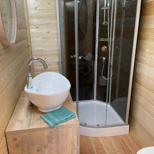 The Crusoe XL Tent offers all-season comfort with a wooden frame and breathable canvas – perfect for stylish family glamping and permanent eco-camps.