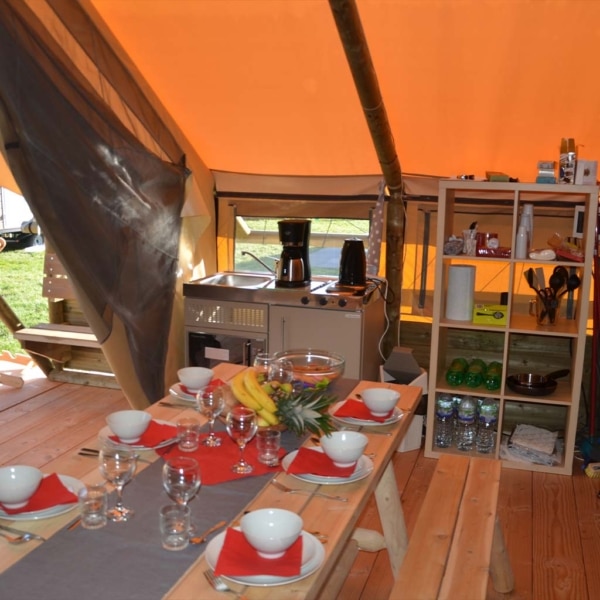 The Crusoe XL Tent offers all-season comfort with a wooden frame and breathable canvas – perfect for stylish family glamping and permanent eco-camps.