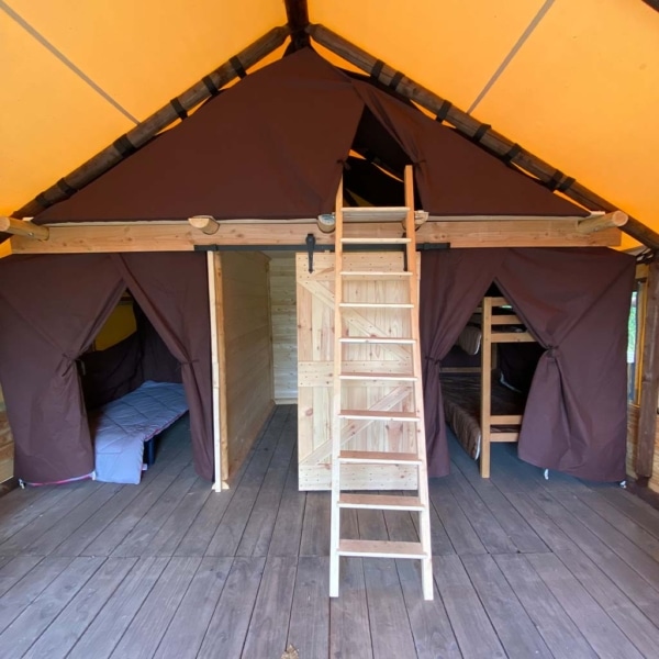 The Crusoe XL Tent offers all-season comfort with a wooden frame and breathable canvas – perfect for stylish family glamping and permanent eco-camps.