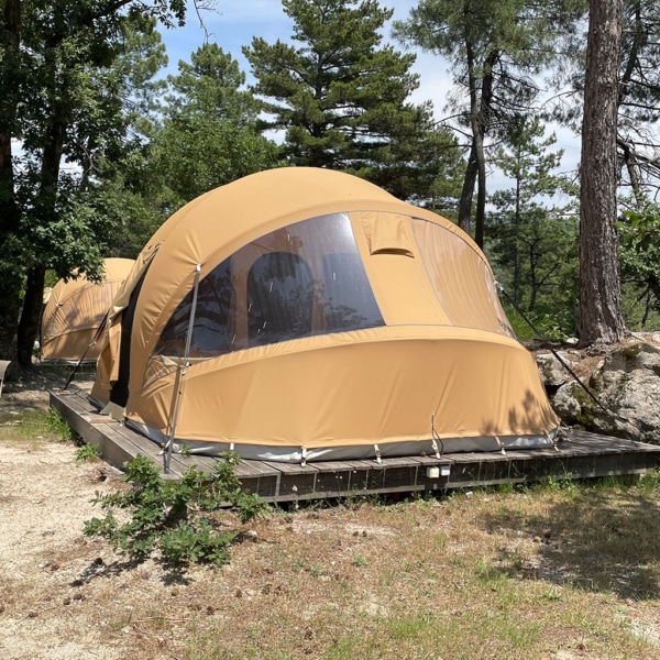 Luxury canvas tent with natural light, easy framing, and weather-resistant design.