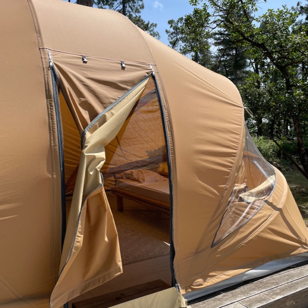 Large, durable glamping tent with quick setup and simple guying system.