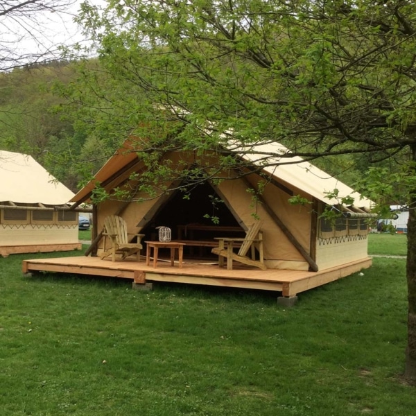 Discover the Robinson Tent: all-wood frame, year-round durability, and eco-chic glamping comfort for resorts or private escapes.