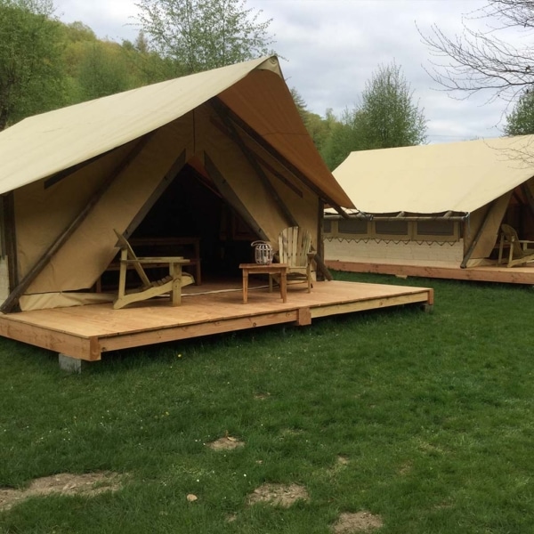 Discover the Robinson Tent: all-wood frame, year-round durability, and eco-chic glamping comfort for resorts or private escapes.