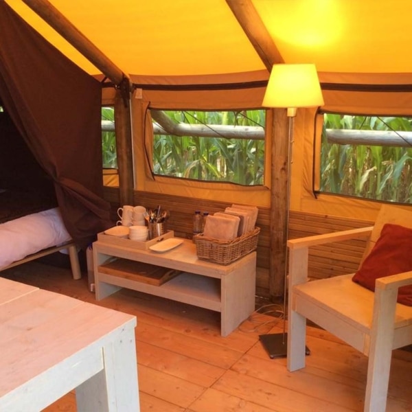 Discover the Robinson Tent: all-wood frame, year-round durability, and eco-chic glamping comfort for resorts or private escapes.