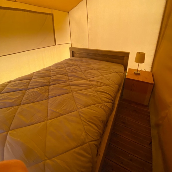 Durable Maasai luxury tent with steel and wood frame for permanent installation.